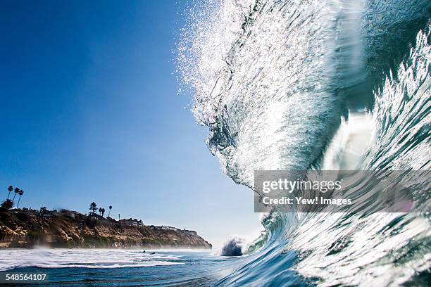 big surfing ocean wave, encinitas, california, usa - tsunami fotografías e imágenes de stock
