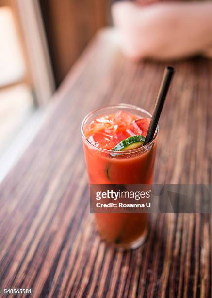 caesar drink with cucumber - tomatensap stockfoto's en -beelden