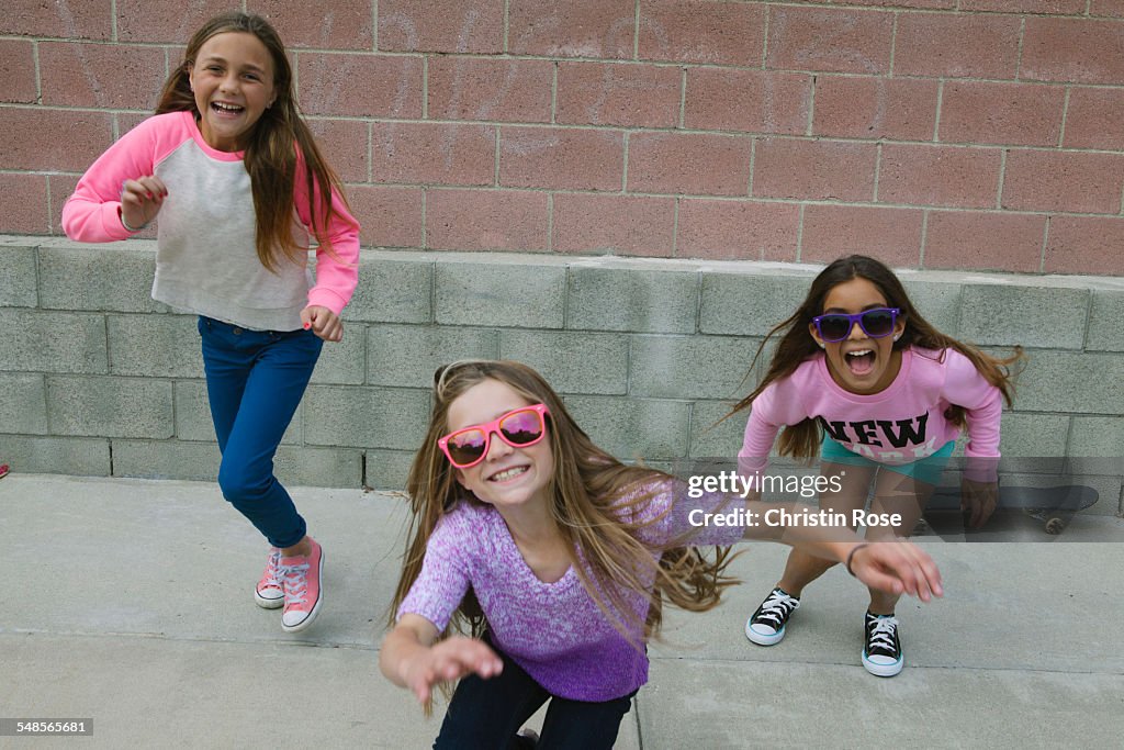 Three girls running