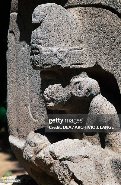 Altar 5 with a priest coming out of a cave holding a child, also known as the Altar to the Mother, Villahermosa, Tabasco, Mexico. Olmec civilisation,...