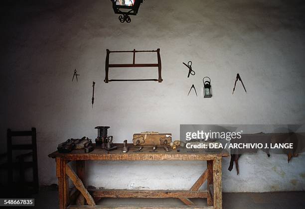 Room set up with tools for leather working, Museum Casa Juarez, Oaxaca de Juarez, Oaxaca, Mexico.
