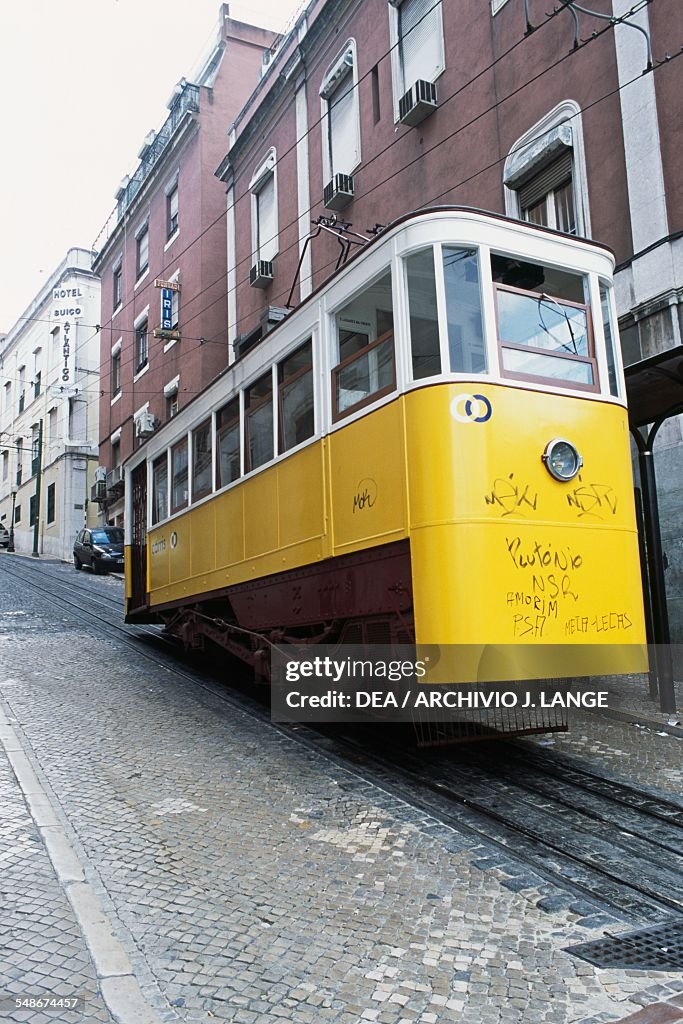 Tram on a street in the Alfama district...