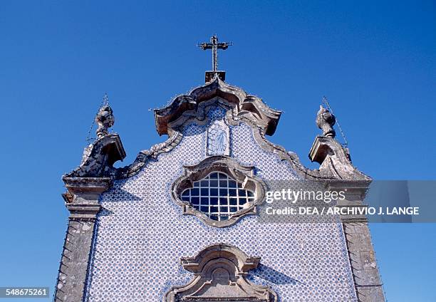 Facade decorated with azulejo tiles of the church of St Antonio da Torre Velha, Ponte de Lima, Norte, Portugal.