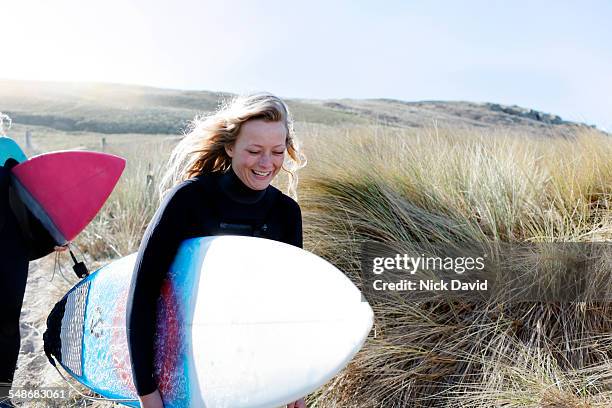 surfer friends - surfing stock pictures, royalty-free photos & images