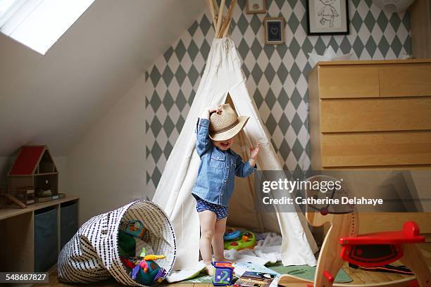 a 2 years old boy playing in his bed - horses playing stock pictures, royalty-free photos & images