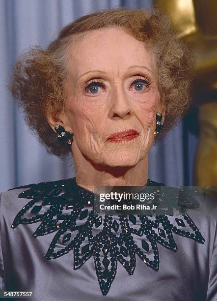 Portrait of American actress Bette Davis as she poses backstage at the Academy Awards, Los Angeles, California, March 30, 1987.