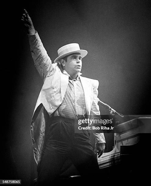 British musician Elton John performs in concert, August 26,1984 at Irvine Meadows Amphitheater in Irvine, California.