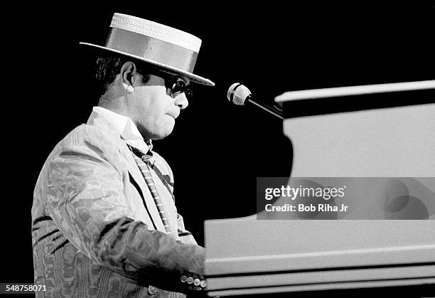 British musician Elton John performs in concert, August 26,1984 at Irvine Meadows Amphitheater in Irvine, California.