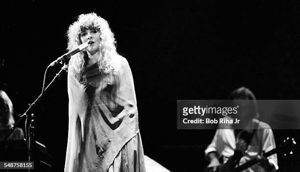 American musician Stevie Nicks of the group Fleetwood Mac performs onstage at the Los Angeles Forum, Inglewood, California, December 6, 1979. Partly...
