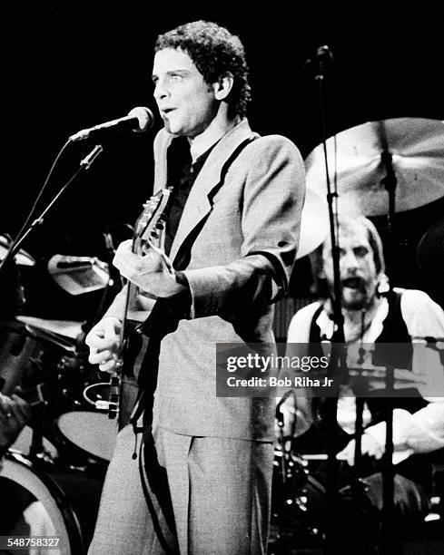 American musician Lindsey Buckingham and British musician Mick Fleetwood of the group Fleetwood Mac perform onstage at the Los Angeles Forum,...