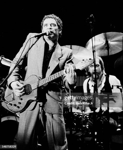 American musician Lindsey Buckingham and British musician Mick Fleetwood of the group Fleetwood Mac perform onstage at the Los Angeles Forum,...