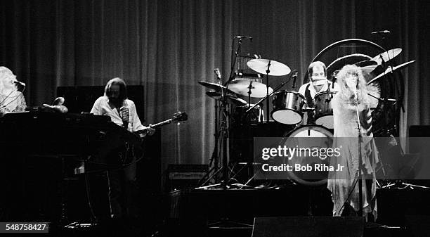 From left, British musicians Christine McVie, John McVie, Mick Fleetwood, and Stevie Nicks of the group Fleetwood Mac perform onstage at the Los...