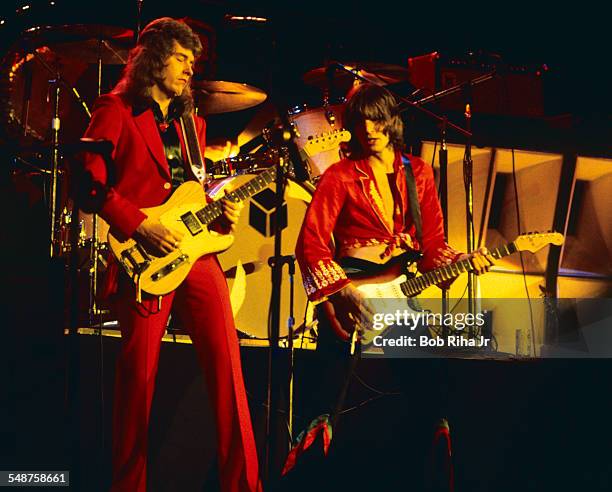 American musicians Roger Fisher and Howard Leese of the rock group Heart perform onstage at the Universal Amphitheatre, Los Angeles, California, July...