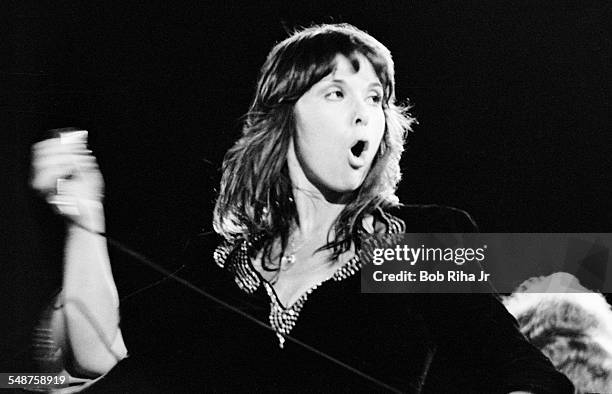 American musician Ann Wilson of the rock group Heart performs onstage at the Universal Amphitheatre, Los Angeles, California, July 15, 1977.