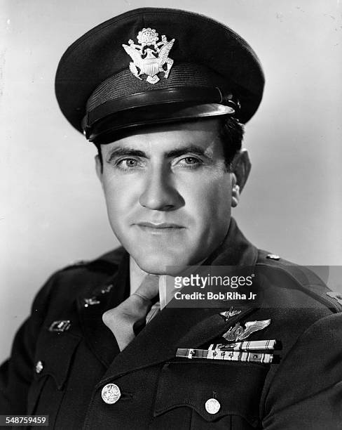 Portrait of American bombardier Lt Louis Zamperini as he poses in uniform, early 1940s.