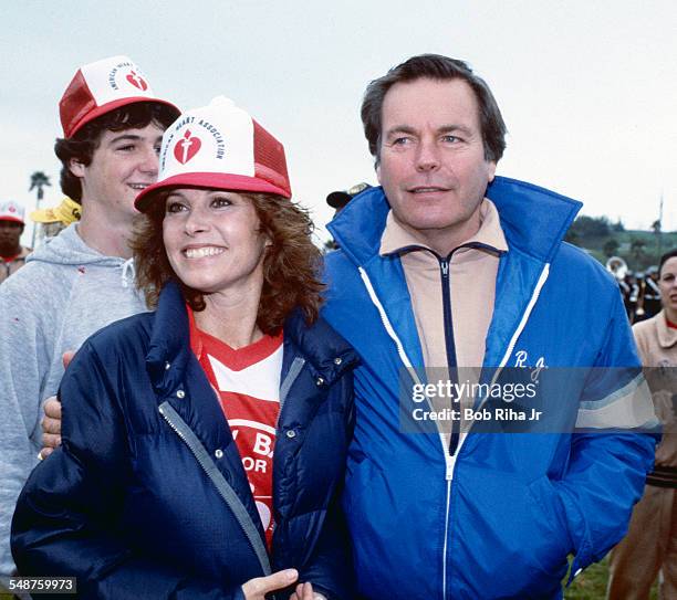 View of American actors Stefanie Powers and Robert Wagner, who play the titular characters in the television show 'Hart to Hart,' as they attend a...