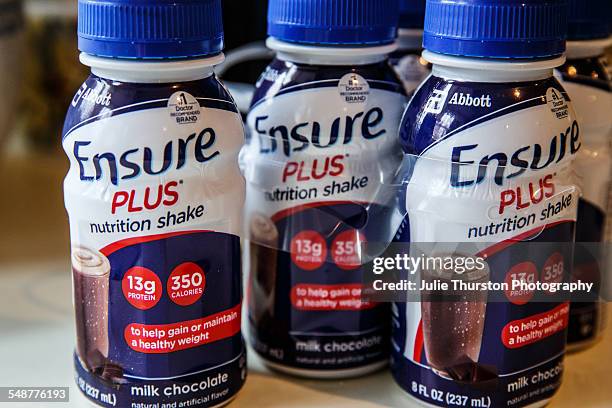 Ensure Plus nutrition shake individual serving plastic bottles with lids. Milk chocolate flavor drink with added nutrients for weight gain or healthy...