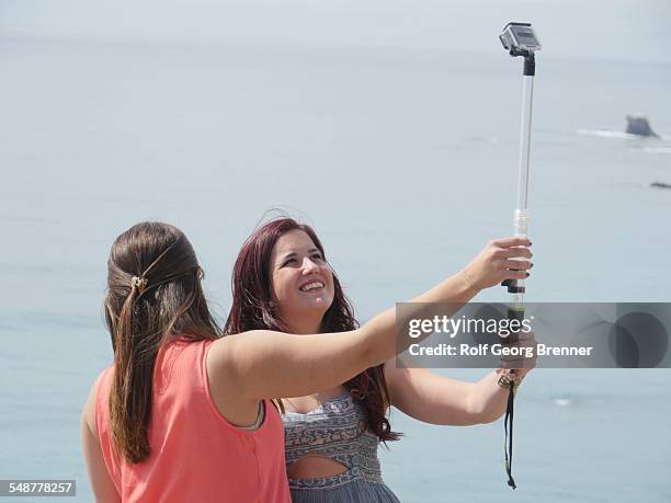 People using selfie stick