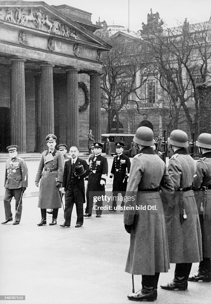 Germany Free State Prussia Berlin : Japanese foreign minister Matsuoka (c) taking the guard of honour at the War Memorial; to his left: Paul von Hase, City Commandant of Berlin, and the Japanese Embassador Hiroshi Oshima - 1941 - Vintage property of 