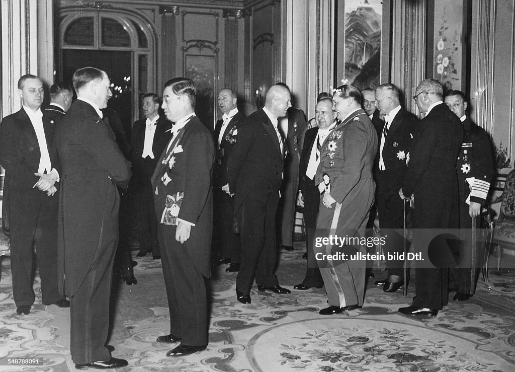 Germany Free State Prussia Berlin : Anti-Comintern Pact Reception in the Japanese embassy on occasion of the 1st anniversary of the signing of the Pact; Kintomo Mushakoji, the Japanese Embassador, is talking to Adolf Hitler; in the background, far le