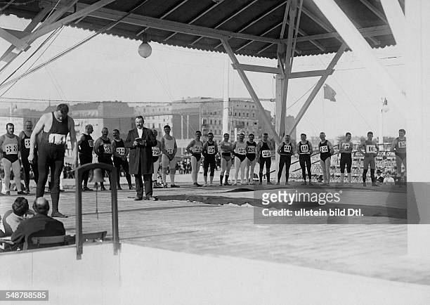 German Empire Kingdom Prussia Berlin Berlin: Wrestling competition at the Kurfuerstendamm: wrestlers lining up for the public weighing - 1901 -...