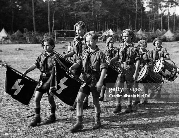 Marching band of the Jungvolk in their summer camp on the Baltic Sea