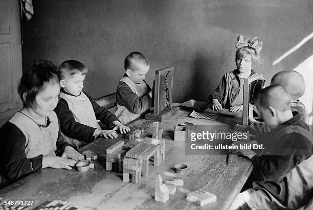 Germany Free State Prussia Berlin Berlin: State Institution for the Blind in Berlin-Steglitz, pupils of the first class doing handicrafts - 1930 -...