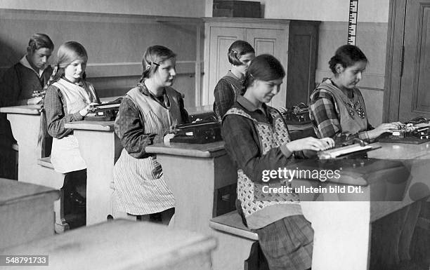 Germany Free State Prussia Berlin Berlin: State Institution for the Blind in Berlin-Steglitz, pupils learning to write on a Perkins Brailler - 1930 -...