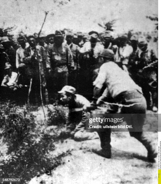 China : Second Sino-Japanese War 1937-1945 Japanese troops committing atrocities among civilians after the capture of the Kuomintang capital Nanjing...