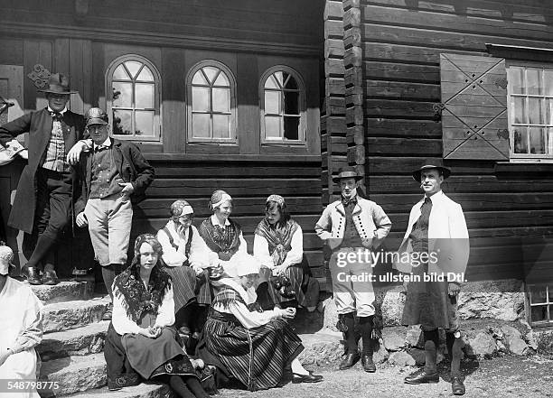 Sweden Stockholm : weekend of the Stokholm youth, members in traditional clothes in front of thier club house - 1928 - Photographer: Frankl - Vintage...