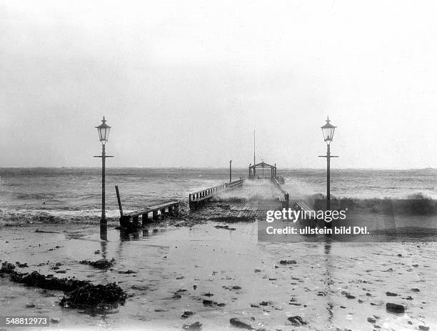 German Empire Kingdom Prussia Schleswig-Holstein Province Helgoland: Thunderstorm at the North Sea: the submerged gangplank during a storm surge -...