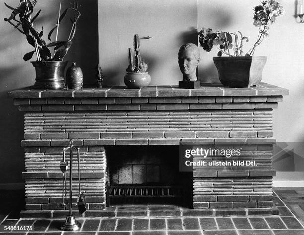 Red clinker fireplace in the house of Korff Architects: Braun and Alfred Gunzenhauser - Photographer: Fotografisches Atelier Ullstein - Published by:...
