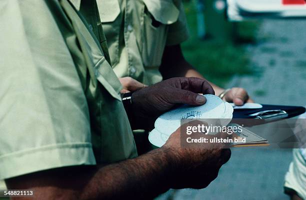 Traffic, Germany, Neuisenburg: Police control of the tachograph belonging to a hazardous material truck. -