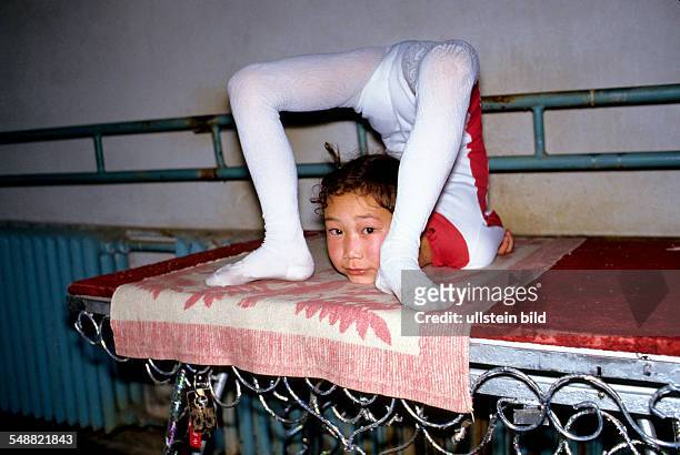 Mongolia, the famous snake girls of the Mongolian state circus training in Ulaanbaatar.