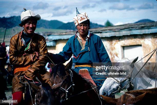 Mongolia, Mongolians in traditional dress at the Naadam festival in Tsertserleg, Arhangay province.