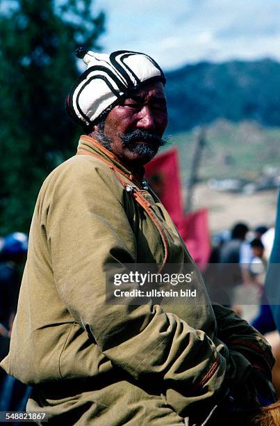 Mongolia, a visitor at the Naadam festival in Tsertserleg, Arhangay province.