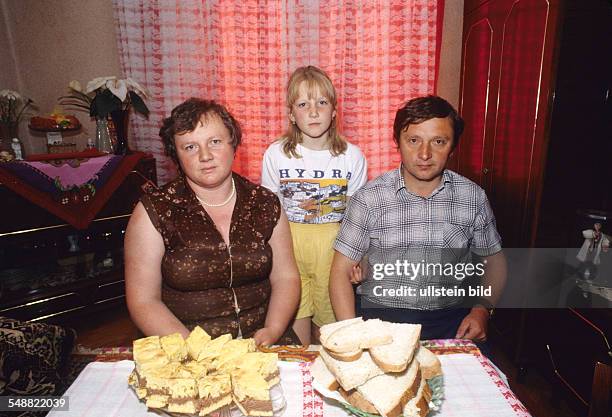 Romania: Local people in their flat in Rehgin.