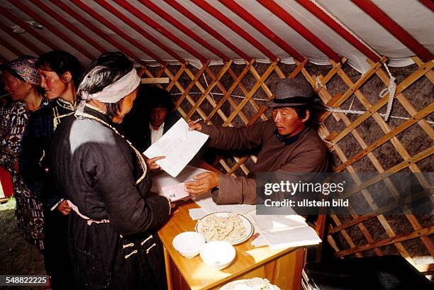 Mongolia, election day. Nomads giving their vote in a Jurt near the Buddhist monastery Amarbayasgalant.