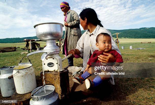Mongolia, using a centrifuge for making butter in the province of Koevsgoel.