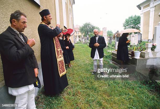Romania: A requiem mass in the orthodox church of Hodac.