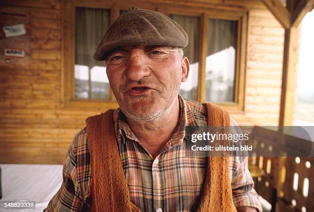 Romania: A drunk Ungarian farmer.