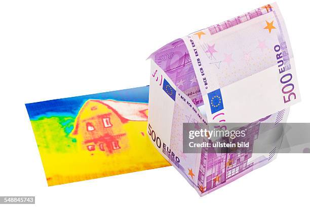 Symbolic photo energy costs, thermal insulation, house made of 500 Eoro banknotes and infrared photo