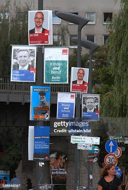 Germany Berlin Kreuzberg - jungle of election posters of the SPD, the Pirat party and the party for social justice PSG at the bridge Oberbaumbruecke -