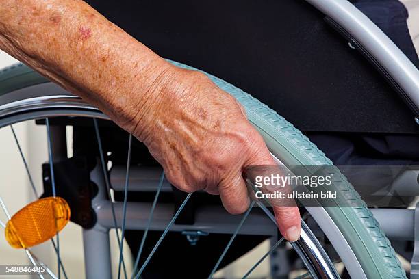 Elder lady in a wheel chair -