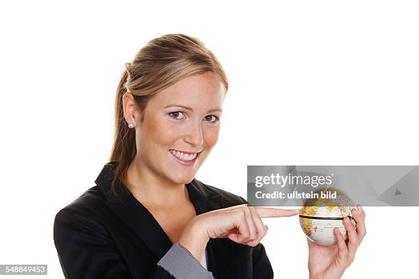 Woman holding a globe in her hand -