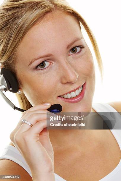 Symbolic photo call-centre, woman with headset -