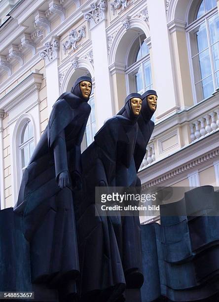 Lithuania Vilnius Vilnius - Figures 'Three Muses of Vilnius' in front of the Drama theater