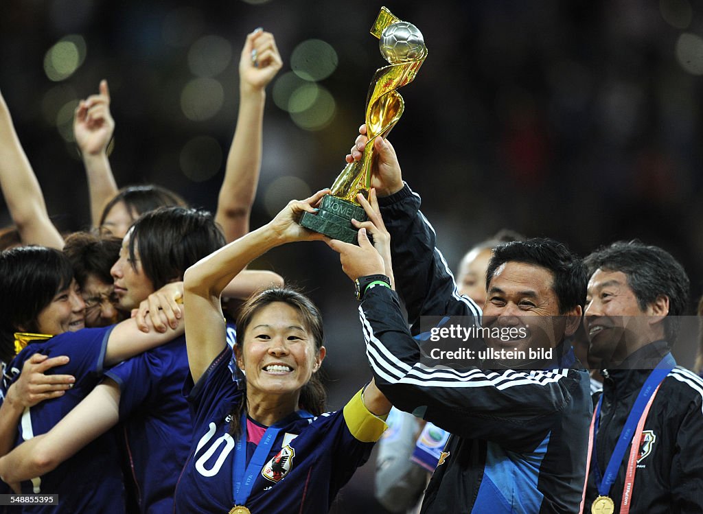 Germany Hesse Frankfurt am Main - FIFA Women's World Cup Germany 2011, final, Japan v USA 5:3 after penalty shootout - Japan's team captain Homare Sawa and coach Norio Sasaki celebrating with her team