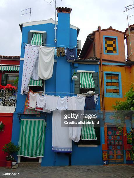 Italy Veneto Venezia - Burano - washing in front of a house