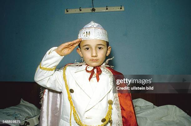 Germany Hesse Kassel - a boy wearing uniform at theTurkish festival of circumcision at the Ayasofya mosque - 1982